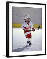 Young Ice Hockey Player in Action-null-Framed Photographic Print