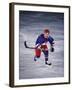 Young Ice Hockey Player in Action-null-Framed Photographic Print