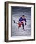 Young Ice Hockey Player in Action-null-Framed Photographic Print