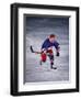 Young Ice Hockey Player in Action-null-Framed Photographic Print