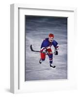 Young Ice Hockey Player in Action-null-Framed Photographic Print