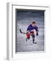 Young Ice Hockey Player in Action-null-Framed Photographic Print