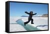 Young Inuit Boy Jumping over a Crack on Ice Floe, Ellesmere Island, Nanavut, Canada, June 2012-Eric Baccega-Framed Stretched Canvas