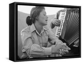 Young Israeli Woman Singing While Accompanied by Someone Playing an Accordion-Paul Schutzer-Framed Stretched Canvas
