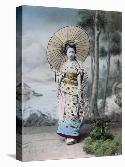 Young Japanese Girl in a Kimono and with a Parasol, Mt.Fuji in the Background, c.1900-Japanese Photographer-Stretched Canvas