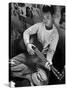 Young Japanese Nisei Playing Guitar in the Stockade at Tule Lake Segregation Center-Carl Mydans-Stretched Canvas