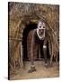 Young Karo Girl in the Doorway of Her Hut in the Village of Duss, Omo River, Southwestern Ethiopia-John Warburton-lee-Stretched Canvas