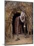 Young Karo Girl in the Doorway of Her Hut in the Village of Duss, Omo River, Southwestern Ethiopia-John Warburton-lee-Mounted Photographic Print