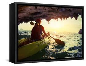 Young Lady Paddling the Kayak from Limestone Cave towards Open Sea-Dudarev Mikhail-Framed Stretched Canvas