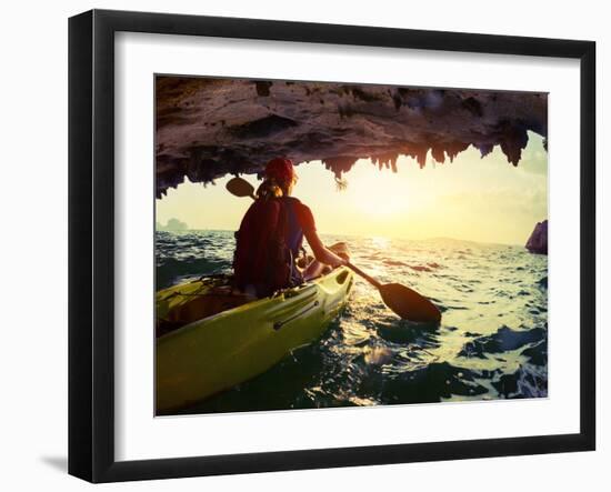 Young Lady Paddling the Kayak from Limestone Cave towards Open Sea-Dudarev Mikhail-Framed Photographic Print