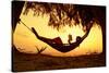 Young Lady Reading the Book in the Hammock on Tropical Beach at Sunset-Dudarev Mikhail-Stretched Canvas
