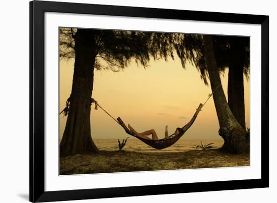 Young Lady Reading the Book in the Hammock on Tropical Beach at Sunset-Dudarev Mikhail-Framed Photographic Print
