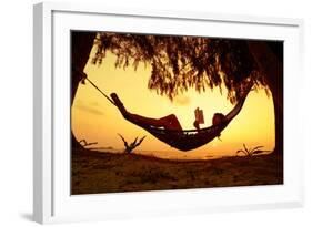 Young Lady Reading the Book in the Hammock on Tropical Beach at Sunset-Dudarev Mikhail-Framed Photographic Print