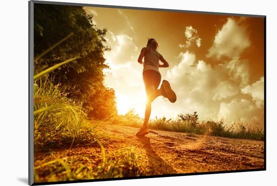 Young Lady Running on a Rural Road during Sunset-Dudarev Mikhail-Mounted Photographic Print