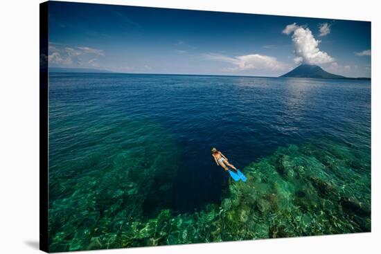 Young Lady Snorkeling over the Reef Wall in the Area of the Island of Bunaken, Sulawesi, Indonesia-Dudarev Mikhail-Stretched Canvas