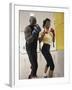Young Male Coach Coaching a Female Boxer-null-Framed Premium Photographic Print