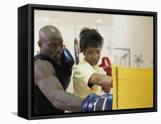 Young Male Coach Coaching a Female Boxer-null-Framed Stretched Canvas