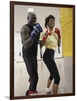 Young Male Coach Coaching a Female Boxer-null-Framed Photographic Print