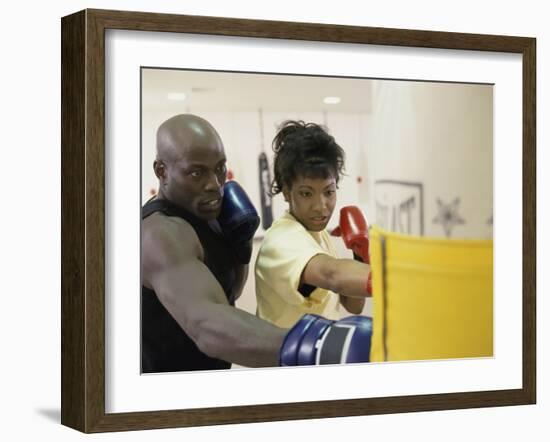 Young Male Coach Coaching a Female Boxer-null-Framed Photographic Print