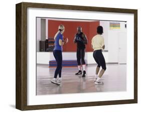 Young Male Coach Coaching Two Female Boxers-null-Framed Photographic Print