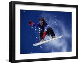 Young Male Snowboarder in Action-null-Framed Premium Photographic Print
