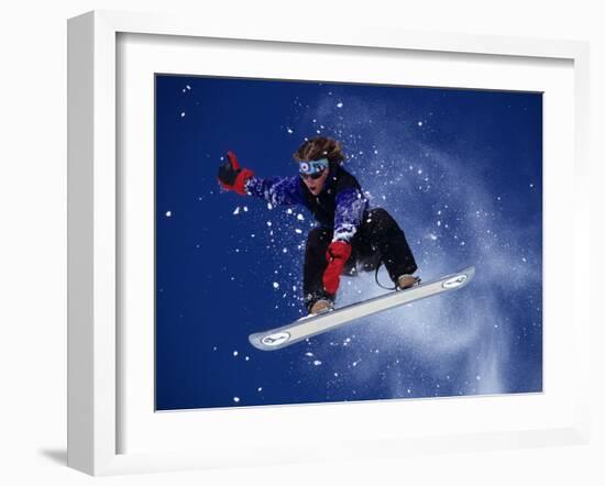 Young Male Snowboarder in Action-null-Framed Photographic Print