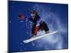 Young Male Snowboarder in Action-null-Mounted Photographic Print