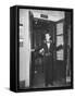 Young Man Blocking the Entrance to the "Lift", in America it Is Called an Elevator-null-Framed Stretched Canvas