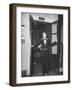 Young Man Blocking the Entrance to the "Lift", in America it Is Called an Elevator-null-Framed Photographic Print