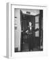 Young Man Blocking the Entrance to the "Lift", in America it Is Called an Elevator-null-Framed Photographic Print