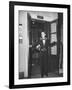 Young Man Blocking the Entrance to the "Lift", in America it Is Called an Elevator-null-Framed Photographic Print