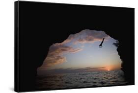 Young Man Diving into Sea at Pirate's Cave-Paul Souders-Framed Stretched Canvas