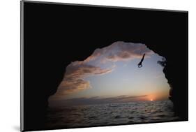 Young Man Diving into Sea at Pirate's Cave-Paul Souders-Mounted Photographic Print