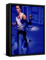 Young Man Exercising in a Gym-null-Framed Stretched Canvas