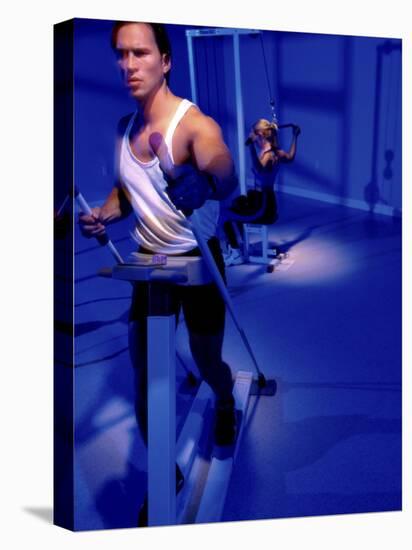 Young Man Exercising in a Gym-null-Stretched Canvas