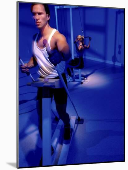 Young Man Exercising in a Gym-null-Mounted Photographic Print