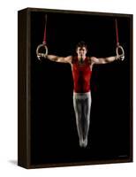 Young Man Exercising on Gymnastic Rings, Bainbridge Island, Washington State, USA-null-Framed Stretched Canvas