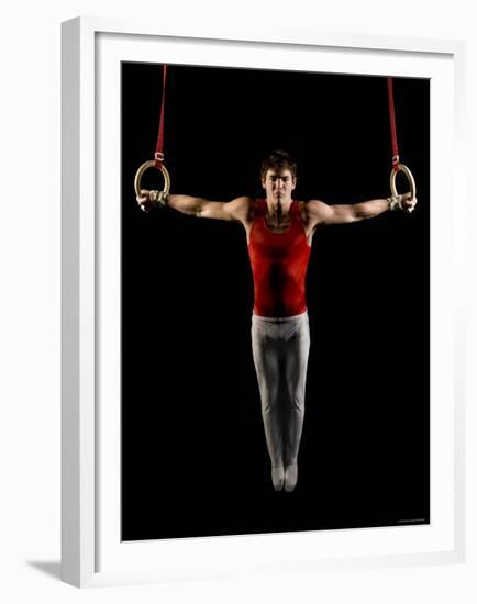 Young Man Exercising on Gymnastic Rings, Bainbridge Island, Washington State, USA-null-Framed Premium Photographic Print