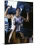 Young Man Exercising with Dumbbells-null-Mounted Photographic Print