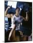 Young Man Exercising with Dumbbells-null-Mounted Photographic Print