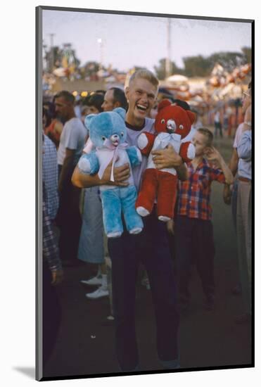 Young Man Holding Stuffed Bears Prizes at a Carnival Game at the Iowa State Fair, 1955-John Dominis-Mounted Photographic Print