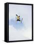 Young Man in Mid Air Wearing Skis-null-Framed Stretched Canvas