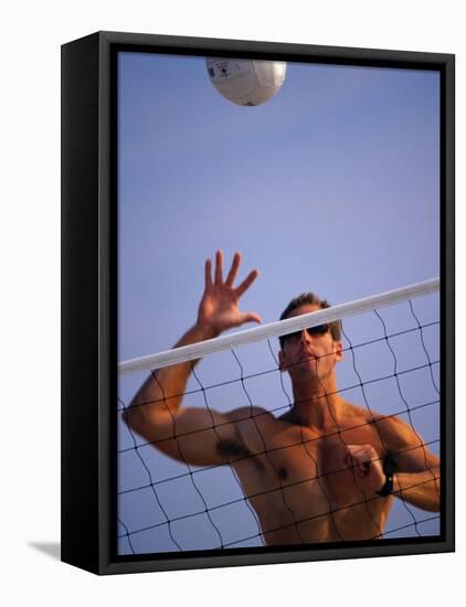 Young Man Playing Beach Volleyball-null-Framed Stretched Canvas