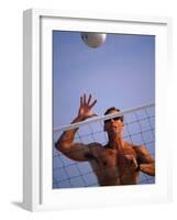 Young Man Playing Beach Volleyball-null-Framed Photographic Print