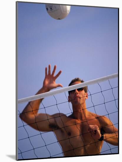 Young Man Playing Beach Volleyball-null-Mounted Photographic Print