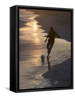 Young Man Playing Football at Sandbeach in Twilight, Santa Maria, Sal, Cape Verde, Africa-Michael Runkel-Framed Stretched Canvas