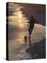 Young Man Playing Football at Sandbeach in Twilight, Santa Maria, Sal, Cape Verde, Africa-Michael Runkel-Stretched Canvas