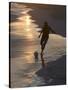 Young Man Playing Football at Sandbeach in Twilight, Santa Maria, Sal, Cape Verde, Africa-Michael Runkel-Stretched Canvas