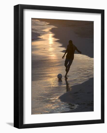 Young Man Playing Football at Sandbeach in Twilight, Santa Maria, Sal, Cape Verde, Africa-Michael Runkel-Framed Photographic Print
