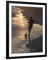 Young Man Playing Football at Sandbeach in Twilight, Santa Maria, Sal, Cape Verde, Africa-Michael Runkel-Framed Photographic Print